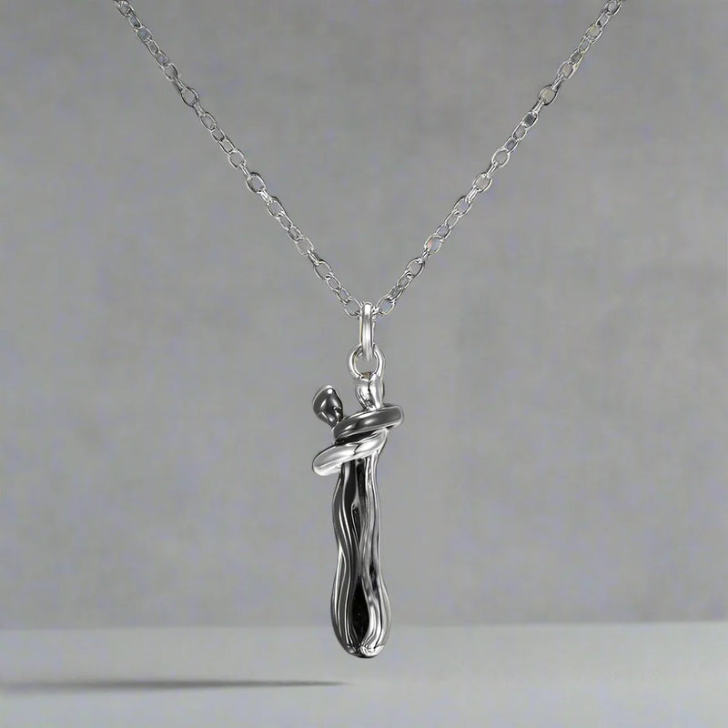 Abrazo Infinito: Collar que Conecta Corazones