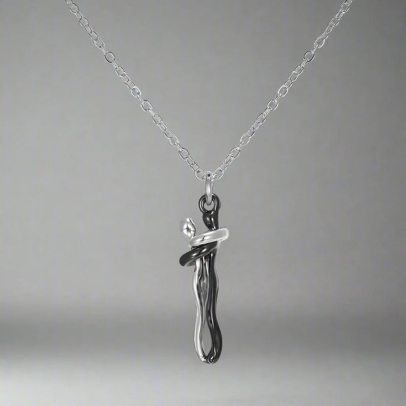 Abrazo Infinito: Collar que Conecta Corazones