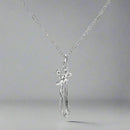 Abrazo Infinito: Collar que Conecta Corazones